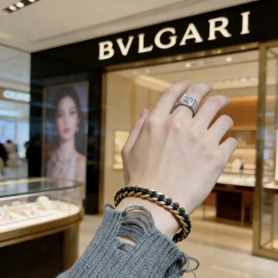 Bvlgari Bvlgari Bvlgari bracelet gold-tone metal with black leather braid 19cm