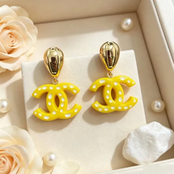 Chanel CC Drop Earrings earrings gold-tone metal bright yellow resin with white polka dots 4 5cm length