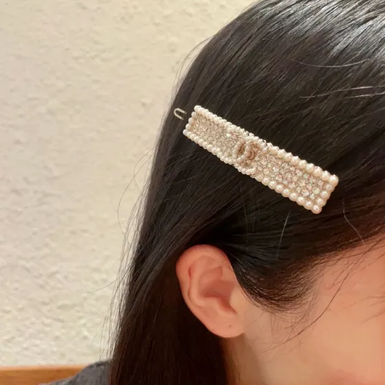 Chanel CC Logo Pearl Crystal Barrette brooch Gold-tone metal cream faux pearl clear crystal 6cm