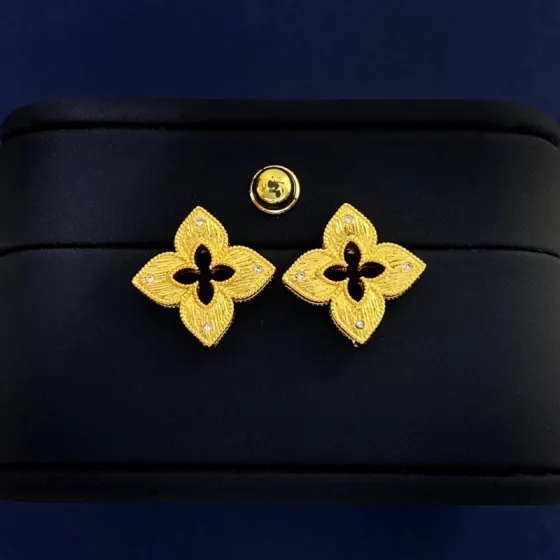 Van Cleef Arpels Venetian Princess earrings yellow gold with clear diamond accents 15mm