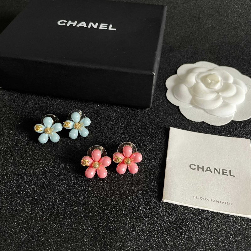 Chanel CC Flower Stud Earrings earrings Gold-tone metal with pastel pink and light blue resin flower accents 1 5cm diameter