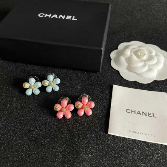 Chanel CC Flower Stud Earrings earrings Gold-tone metal with pastel pink and light blue resin flower accents 1 5cm diameter