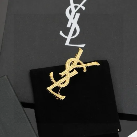 Saint Laurent Cassandre YSL Monogram Bamboo Brooch brooch gold-tone metal no accent stones 4 5cm width