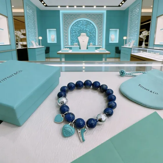 Tiffany Co Return to Tiffany Charm Bead Bracelet bracelet Sterling silver with deep blue lapis lazuli beads and signature Tiffany Blue enamel charms 18cm