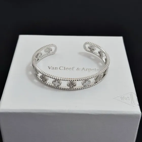 Van Cleef Arpels Perlee Clovers bracelet Silver-toned white gold with white mother-of-pearl and clear diamond accents 17cm