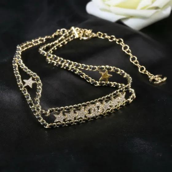 Chanel CC Star Crystal Leather Woven Choker necklace Gold-tone metal black leather clear crystal 38cm with 5cm extender