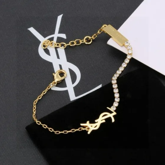 Saint Laurent Cassandre YSL Monogram Crystal Chain Bracelet bracelet Gold-tone metal with clear faceted crystals also available in silver-tone metal with clear faceted crystals 19cm with 3cm extender