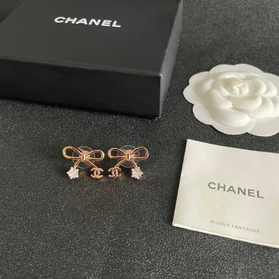 Chanel CC Bow Star Charm Stud Earrings earrings Rose gold-toned metal with clear faceted star-shaped stone accents One Size 1 5cm width per earring