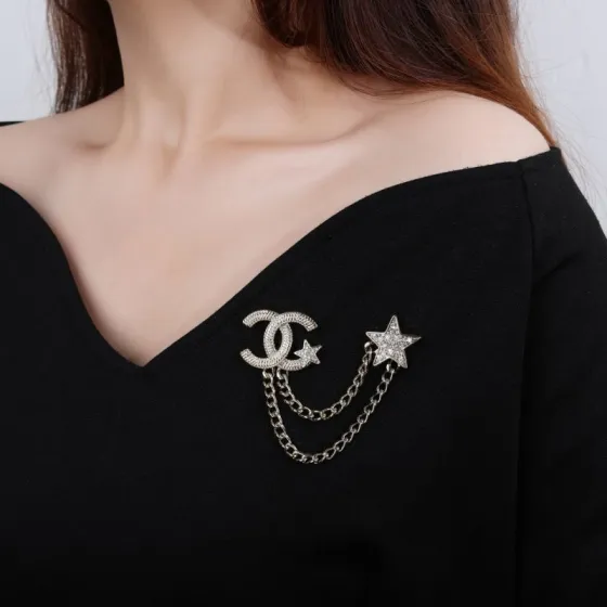 Chanel CC Star Chain Brooch brooch light gold metal with clear crystal accents 4cm width