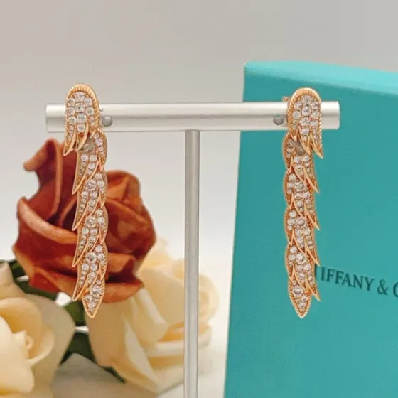 Tiffany Co Feather Drop earrings Rose gold metal with clear diamond-like gemstones 4 5cm length