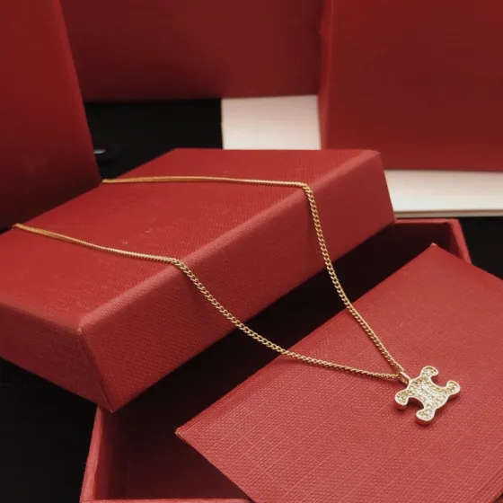 Celine Triomphe Crystal Pendant necklace gold-tone metal with clear crystal accents 45cm