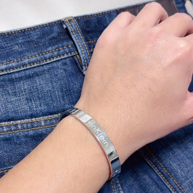 Calvin Klein CK Logo Engraved Bangle bracelet Silver Gold Rose Gold polished metal no gemstones 19cm