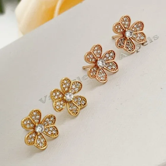 Van Cleef Arpels Frivole earrings yellow gold with clear diamond accents 9mm stud diameter