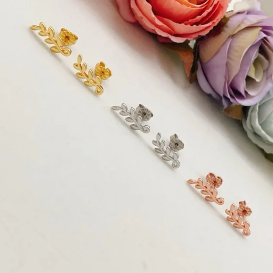 Tiffany Co Olive Leaf Climber Earrings earrings Available in 18k yellow gold sterling silver and 18k rose gold no gemstones 12mm length