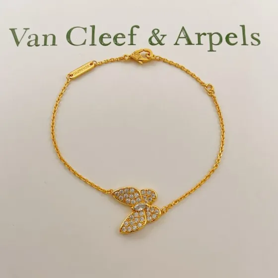 Van Cleef Arpels Two Butterfly bracelet yellow gold with clear diamonds 17cm