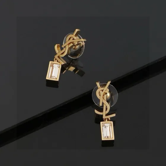 Saint Laurent Cassandre YSL Monogram Crystal Drop earrings Gold-tone metal with clear baguette-cut crystals Silver-tone metal with clear baguette-cut crystals 2 2cm drop length