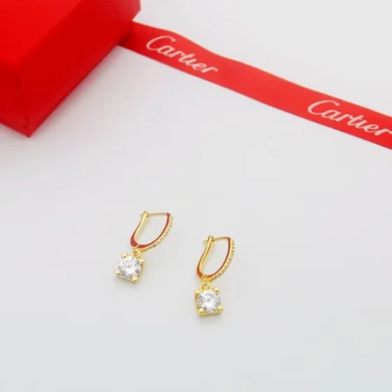 Cartier C de Cartier Diamond Drop Earrings earrings Yellow gold with clear round-cut diamond simulants red enamel accent available variants in rose gold and white gold with clear stones 15mm drop length
