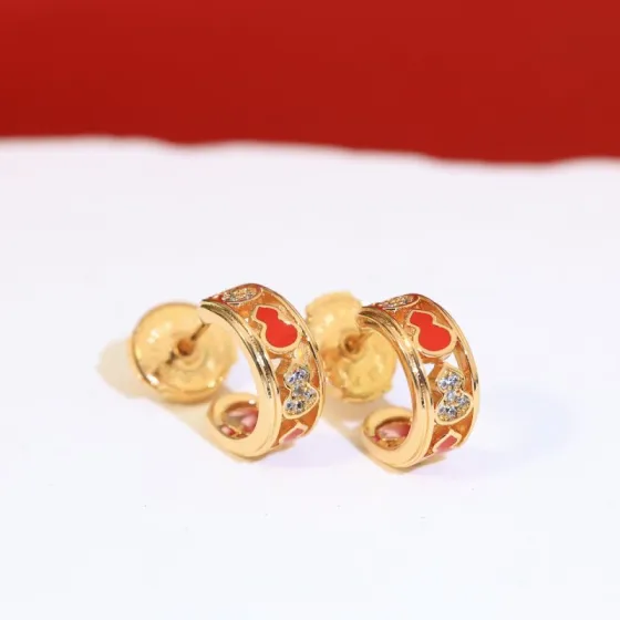 Qeelin Wulu earrings gold-tone metal red enamel clear diamond simulants 10mm hoop diameter