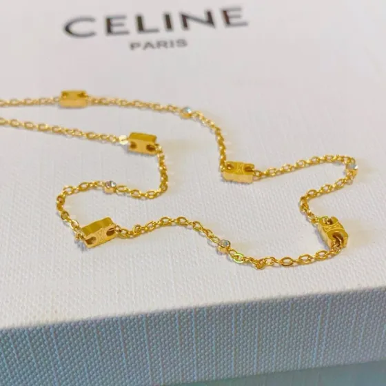 Celine Triomphe Mini Charms necklace gold-tone metal with clear crystal accents 40cm