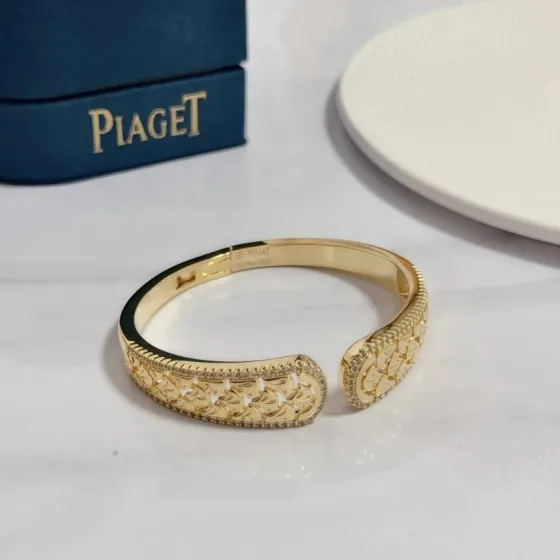 Piaget Rose Passion Open Cuff bracelet 18k yellow gold with clear diamond accents 16cm inner circumference