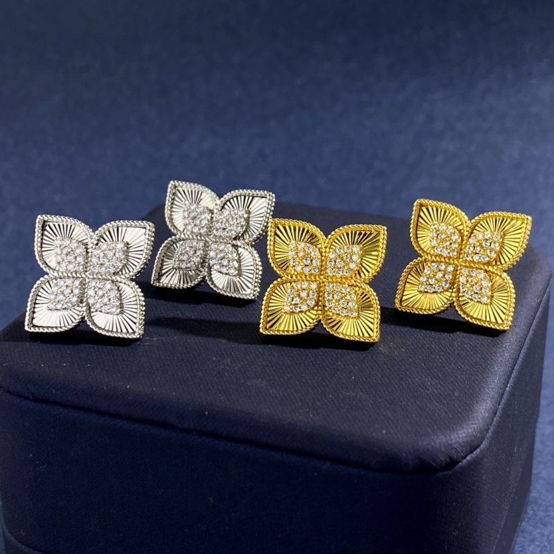 Van Cleef Arpels Vintage Alhambra earrings 18k yellow gold with clear diamond accents 18k white gold with clear diamond accents 15mm