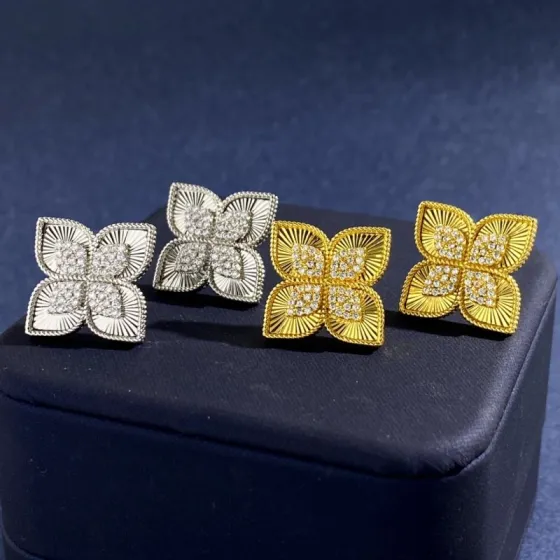 Van Cleef Arpels Vintage Alhambra earrings 18k yellow gold with clear diamond accents 18k white gold with clear diamond accents 15mm