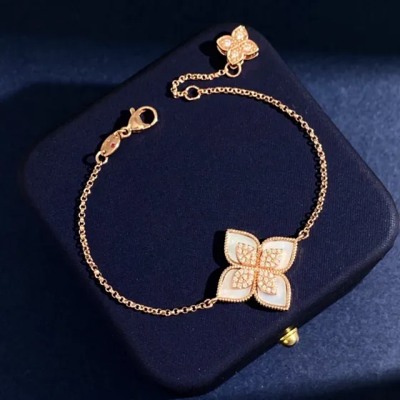 Van Cleef Arpels Princess Flower bracelet Rose gold with white mother-of-pearl malachite turquoise black onyx lapis lazuli and diamond accents 17cm