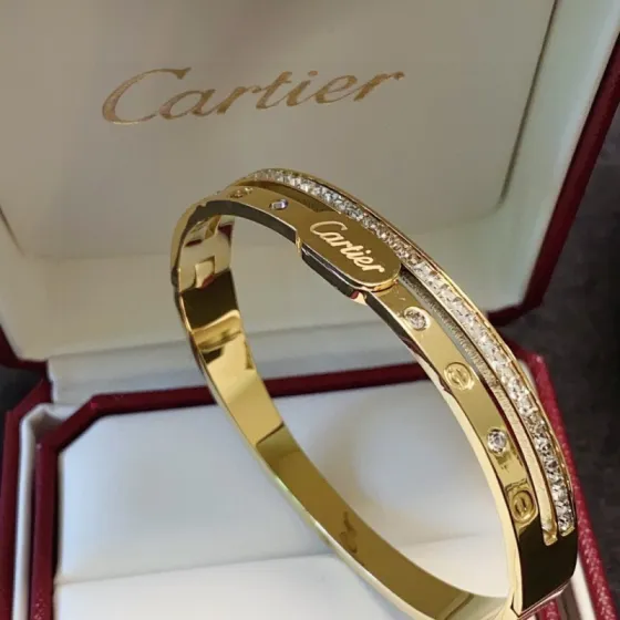 Cartier Love bracelet 18k yellow gold with clear diamond accents 17