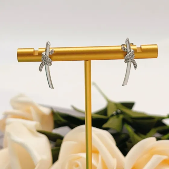 Tiffany Co Knot earrings sterling silver with clear diamond accents 12mm width