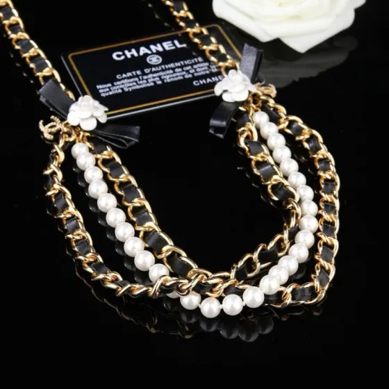 Chanel Camellia Pearl Leather Chain Choker necklace Gold-tone metal black leather white faux pearl white camellia accents 40cm with 5cm extender