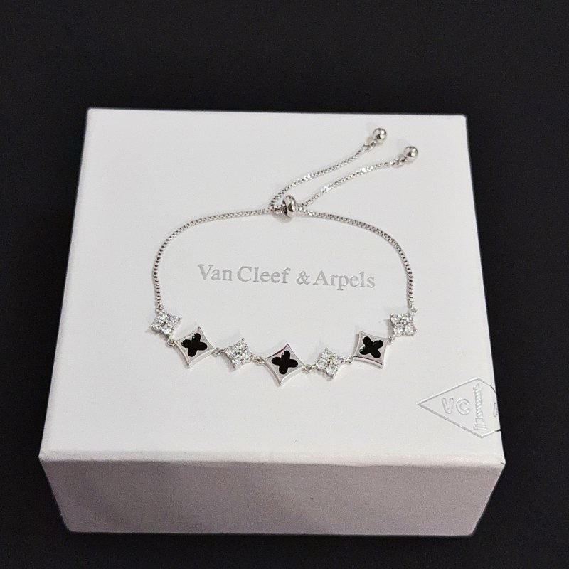 Van Cleef Arpels Alhambra bracelet Silver-toned metal black onyx inlay clear diamond accents Adjustable sliding bolo chain maximum extended length 22cm