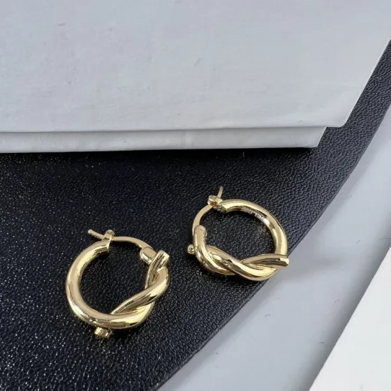 Celine YHED045 Twist Hoop earrings Gold-tone metal first variant Silver-tone metal second and third variants no gemstones 2cm diameter