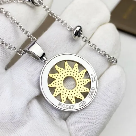 Bvlgari Bvlgari Bvlgari Sun Pendant necklace 18k white gold chain and bezel 18k yellow gold sun motif clear pave diamonds 65cm