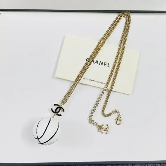 Chanel CC Basketball Pendant Necklace necklace Gold-tone metal white enamel with black line detailing black enamel CC logo 60cm with 7cm extender chain