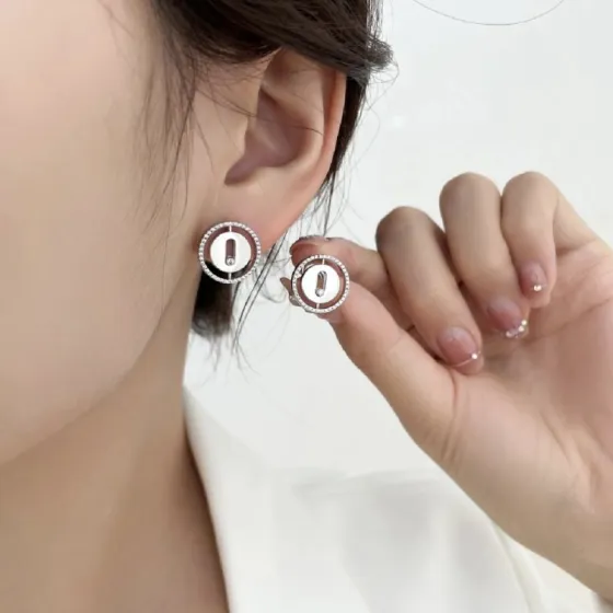 Messika Lucky Move earrings gold-tone metal with clear diamond accents silver-tone metal with clear diamond accents 1 5cm diameter