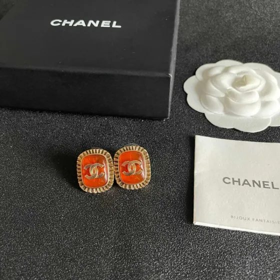 Chanel CC Logo Ribbed Edge Resin Stud Earrings earrings gold-tone metal orange resin 2cm diameter