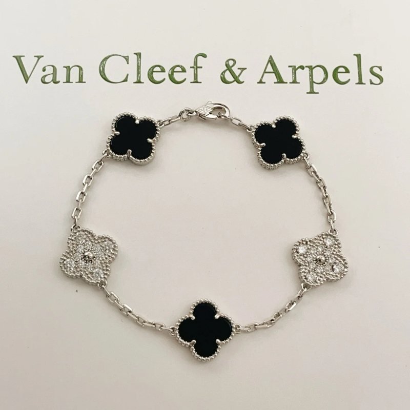 Van Cleef Arpels Alhambra bracelet Silver-toned white gold metal with black onyx and clear diamond accents 19cm