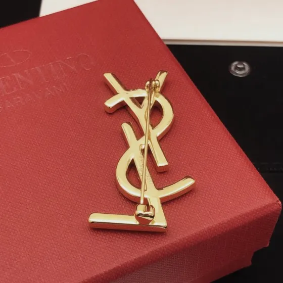 Saint Laurent Cassandre YSL Monogram Brooch brooch gold-tone metal with clear crystal rhinestones 4 5cm length