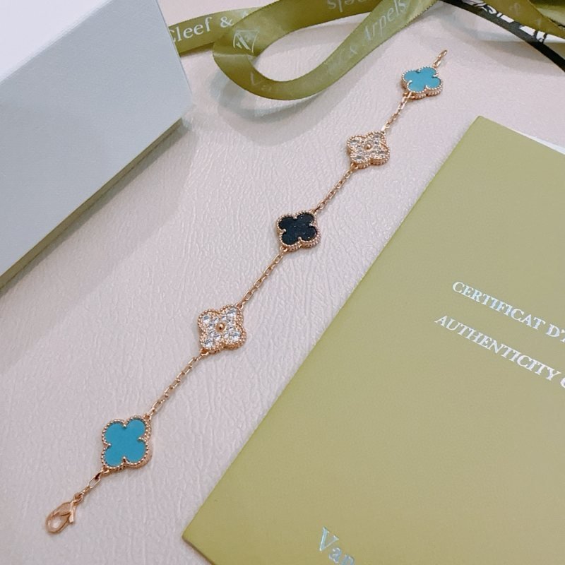 Van Cleef Arpels Alhambra bracelet Rose gold metal with turquoise blue black and clear diamond-accented four-leaf clover motifs 18cm