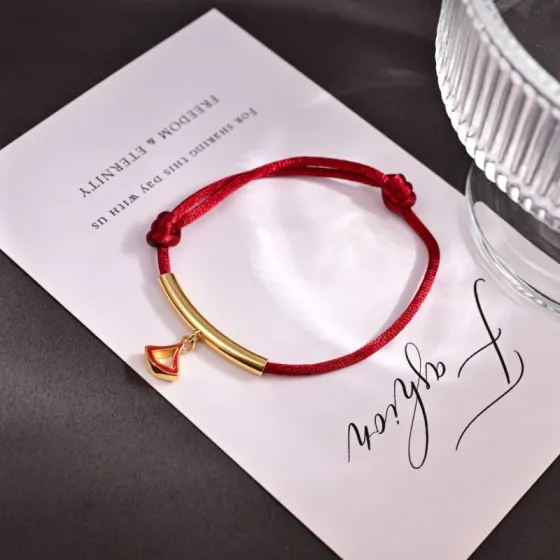 Bvlgari Divas Dream bracelet yellow gold metal red cord red enamel charm adjustable sliding knot fits 15-19cm wrist