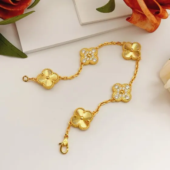 Van Cleef Arpels Vintage Alhambra bracelet Yellow gold with clear diamond accents 19cm