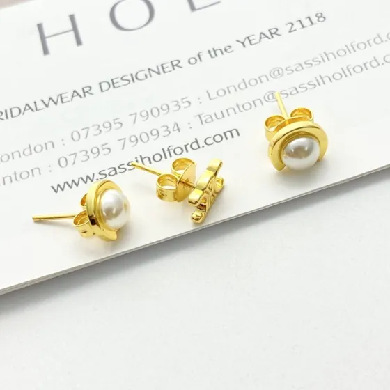 Celine Triomphe Pearl Stud Earrings earrings Gold-tone metal with white pearl accents One Size standard stud post length