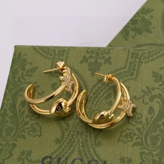 Celine Triomphe Heart Double Hoop Earrings earrings gold-tone metal with clear cubic zirconia accents 1 5cm hoop diameter