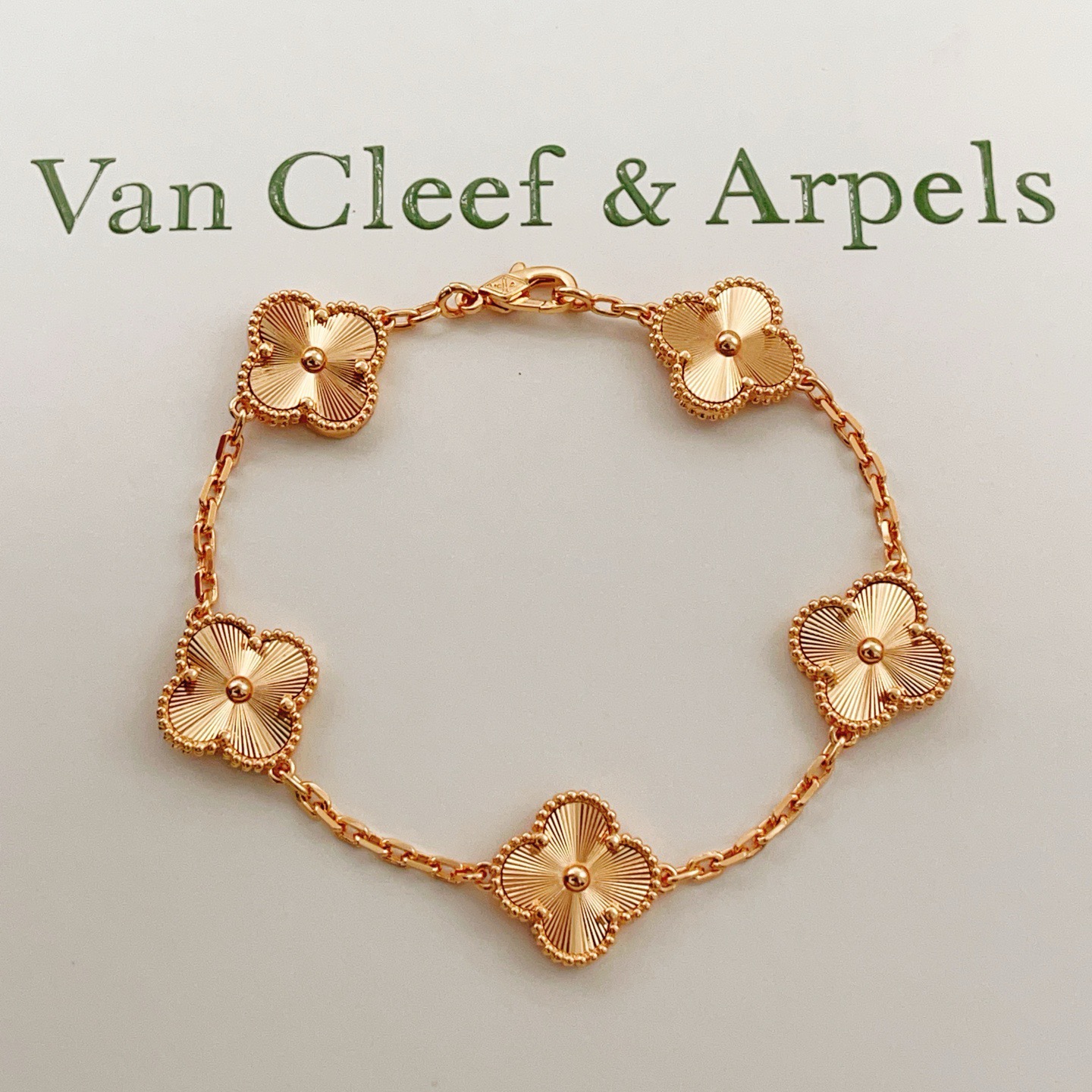 Van Cleef Arpels Vintage Alhambra bracelet 18k yellow gold with guilloche engraved clover motifs 18cm