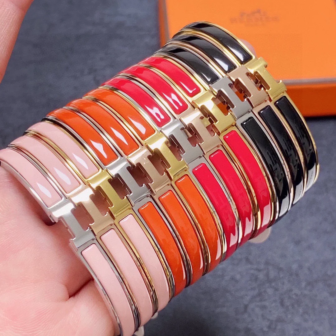 Bracciale Hermes Clic H metallo oro rosa con smalto bianco MM