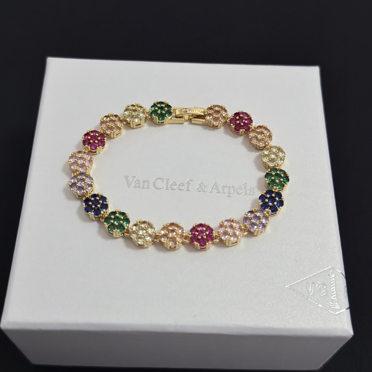 Van Cleef Arpels Fleurette Multi Gemstone Bracelet bracelet Yellow gold with multicolor gemstones fuchsia pink emerald green sapphire blue lavender purple champagne clear white 18cm