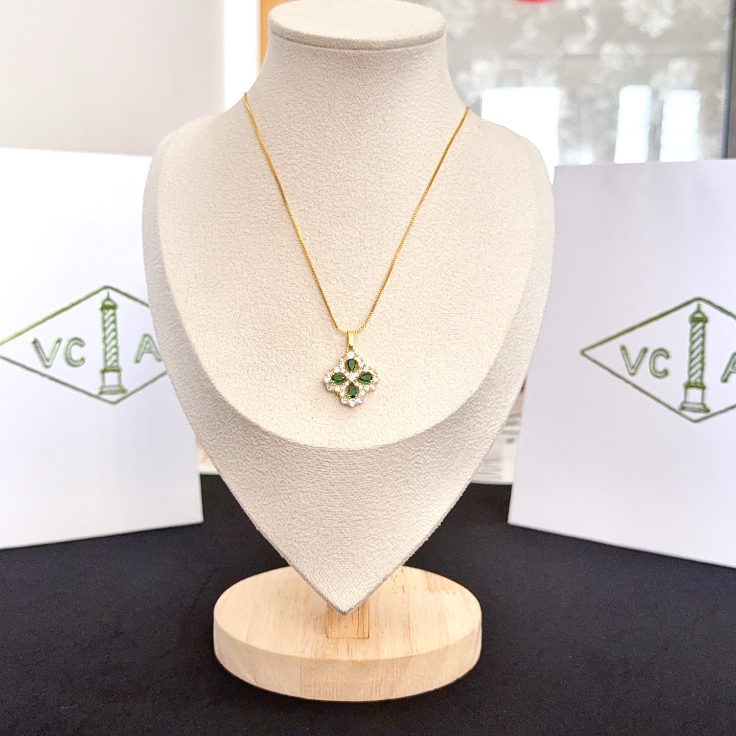 Van Cleef Arpels Alhambra necklace yellow gold metal with green gemstones and clear diamond accents 42cm