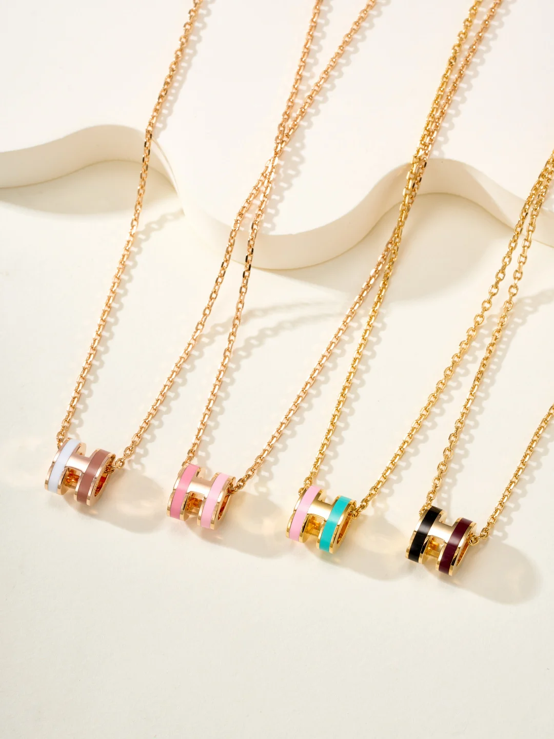 Collana Hermes Mini Pop H Rocabar metallo oro rosa con smalto bianco e marrone 40 cm