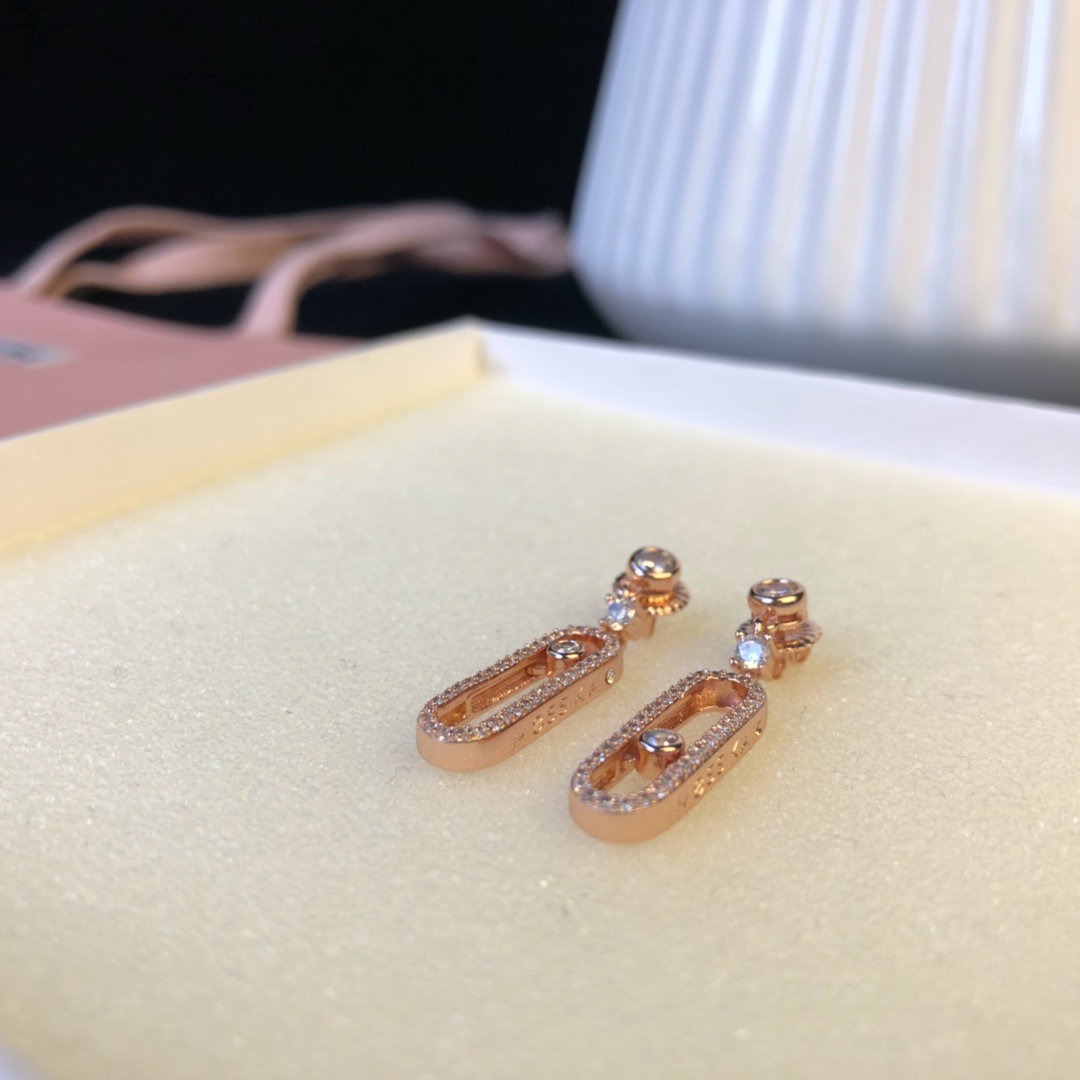 Messika Move Uno earrings Available in 18k rose gold 18k yellow gold and 18k white gold all set with clear round brilliant diamonds 2 5cm drop length