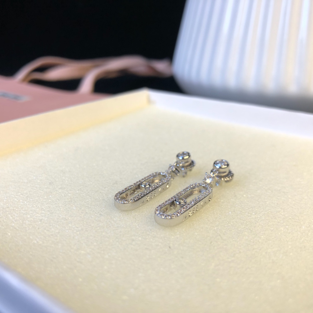 Messika Move Uno earrings Available in 18k rose gold 18k yellow gold and 18k white gold all set with clear round brilliant diamonds 2 5cm drop length